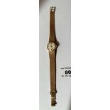 9k gold ladies Omega watch with 9k gold bracelet, total w: 30.42 grams, includes orginal paperwork
