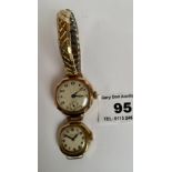 9k gold ladies watch with plated elasticated strap and another 9k gold ladies watch, no strap