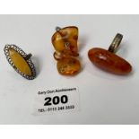 2 Baltic amber rings ( 1 silver) and amber keyring total w: 17 grams