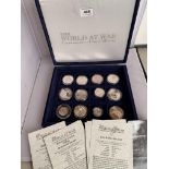 Cased set of The World At War Commemorative Coin Collection containing 12 coins and certificates