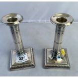 Small pair of silver candlesticks, 5” high, Sheffield, total w: 10.69 ozt (filled bases)