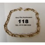 9k gold link bracelet, w: 3.15 grams, length 7.5”