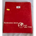 World First Day Bank note cover album including Cuba, Finland, Mexico, Poland, Argentina, USA,