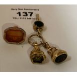 Plated seal fob with orange stone, 2 plated fibs with plated watch key