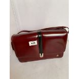 Barker of Earls Barton burgundy leather patent handbag