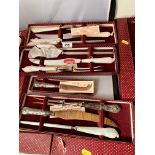 4 boxed sets of silver handled carving sets
