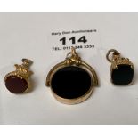 9k gold fob with red stone, 9k gold fob with black stone and plated spinning fob