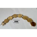 Unmarked bracelet with 6 full sovereigns, 1886, 1907, 1911, 1891, 1911 and 1908, total w. 58.3