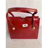 Widegate red leather patent handbag