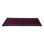 Zabol runner, geometric red design on deep blue ground, 77" x 40" approx