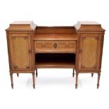 Sheraton style mahogany sideboard, with a central fluted drawer and open shelf under flanked by