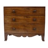 19th century mahogany and boxwood inlaid chest of three graduated drawers over a shaped frieze and