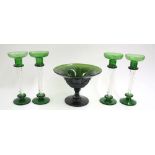 Four green glass and clear air twist stem candlesticks, 9.5" high, a green pressed glass pedestal