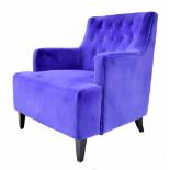 Large purple button back velvet upholstered square low lounge chair, on ebonised squared tapering