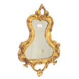 19th century giltwood and gesso lyre shaped wall mirror with a foliate frame, 26" x 16"