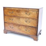 19th century mahogany chest of drawers, with a pull-out brush slide over three graduated long