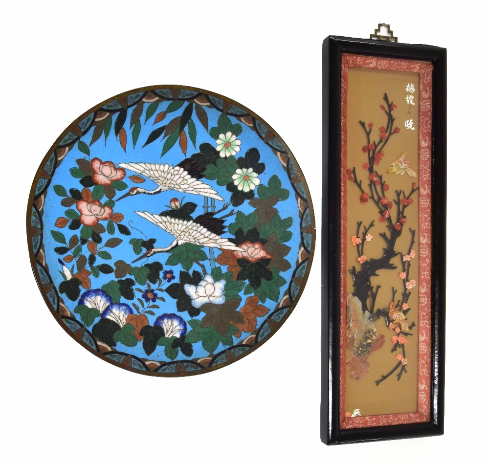 Japanese cloisonne plate, decorated with storks amongst trees on a blue ground, 12" diameter: also