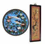 Japanese cloisonne plate, decorated with storks amongst trees on a blue ground, 12" diameter: also