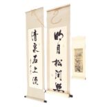 Three Chinese scrolls, one depicting a figure in a traditional landscape, signed, 24.5" x 7.5"; also