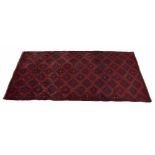 Shiraz red ground rug, allover geometric design, 100" x 51" approx