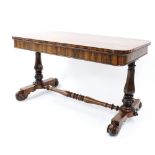 19th century rosewood rectangular library table, the figured top over alternate side short