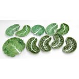 Assorted Portuguese majolica green glaze leaf dishes, four F. Subtil crescent examples, 8" long,