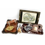 Walnut inlaid serpentine gallery tray, two further trays, one brass inlaid and the other with an