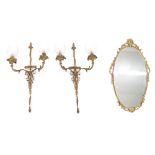 Pair of Neo Classic style cast gilt metal twin-branch wall light fittings, modelled with scrolling