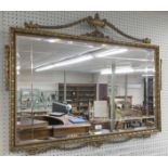 Neoclassical style overmantel mirror, the gilt wooden frame with urn finial and harebell swags, 37"