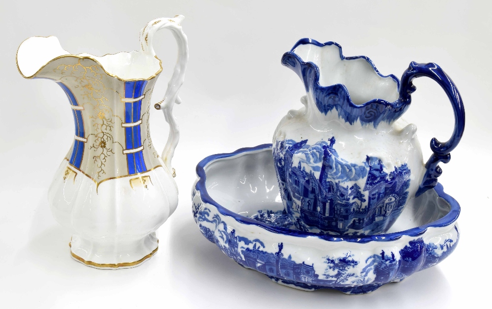 Reproduction blue and white water jug and wash basin, decorated with Continental town square scene