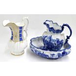 Reproduction blue and white water jug and wash basin, decorated with Continental town square scene