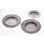 Pair of Keswick School of Industrial Art small planished silver dishes, with fruiting vine