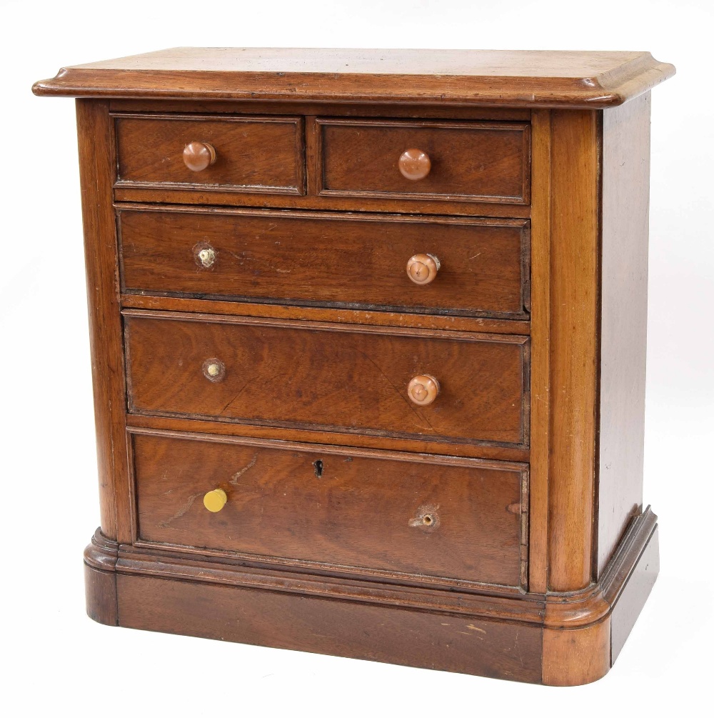 Victorian mahogany apprentice/table top miniature chest of drawers, the moulded top over two short