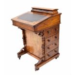 Victorian walnut inlaid Davenport, with a stationery compartment over the hinged fall front inset