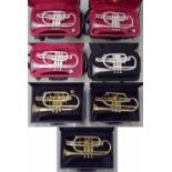 *Four JP silver plated cased cornets; also three various gold lacquered cased cornets, all in need