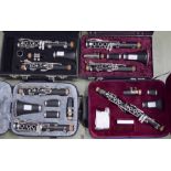 Four various cased clarinets, by Amati Kraslice (ACL201), Kinder Klari, Rosetti and another