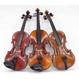 Three various old three-quarter size violins (3)