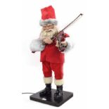 Novelty electric automata modelled as Father Christmas playing the violin, also with a change of