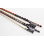 Two silver mounted violin bows, both indistinctly stamped and with faults (2)