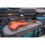 *Large quantity of contemporary ex-student quality small size violins, most with cases and bows,