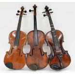 Three old full size violins and two bows