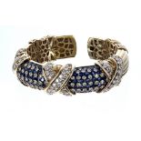 Impressive Italian 18ct pavé sapphire and diamond sprung cuff bangle, 84.1gm, width 19mm