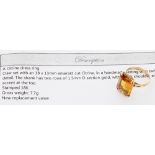 18ct citrine single stone dress ring, claw set in a yellow gold split shoulder shank with bead