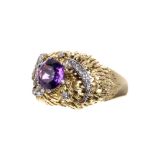 18ct amethyst and diamond high set fancy dress ring, 16mm high, 15.3gm, ring size L