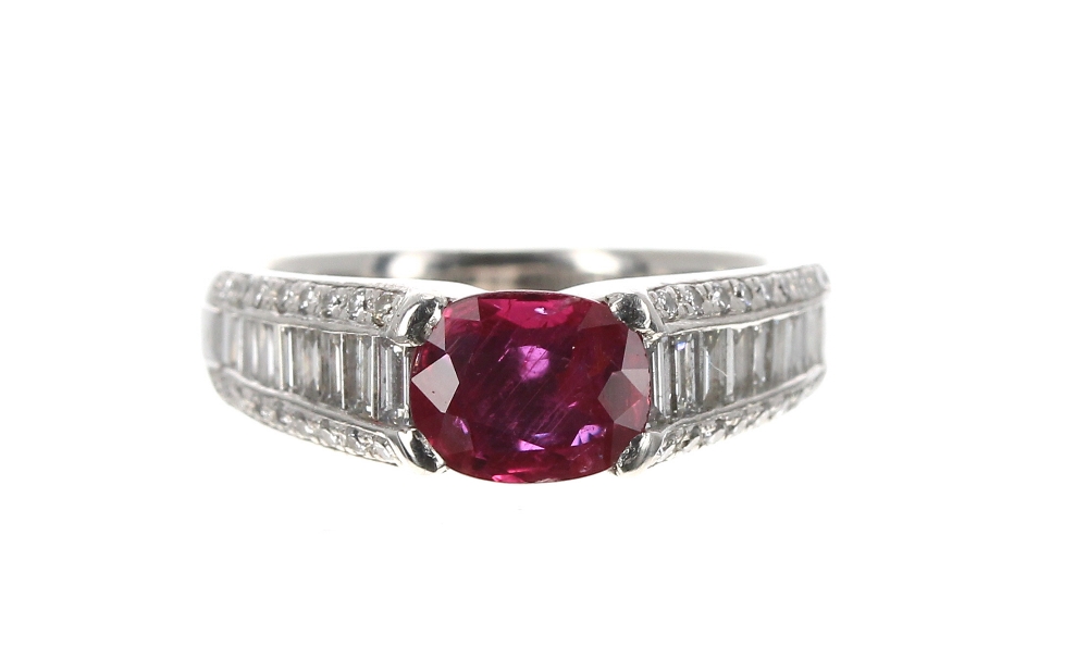 Good platinum and natural ruby ring with diamond set shoulders, the ruby 0.96ct approx, with eight