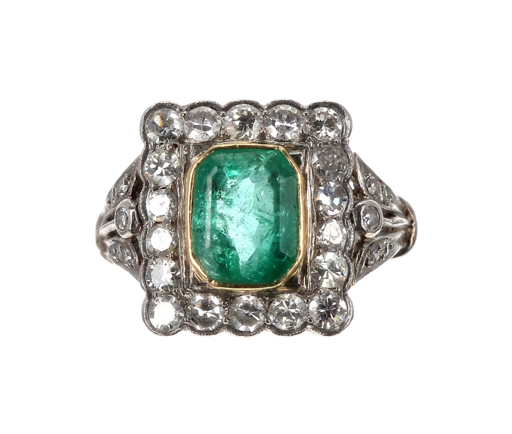 Good platinum emerald and diamond cluster ring, the cushion-cut emerald of good colour, 1.65ct