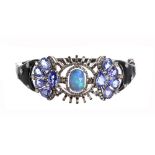 Attractive opal, tanzanite and enamel set silver and black enamelled bangle, oval facet opal in a