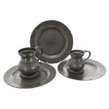 Three mid-18th century pewter plates, all stamped with London makers marks to the underside, largest