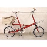 Moulton Stowaway bicycle, red, 20" frame, front and rear pannier racks