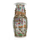 Chinese Canton famille rose porcelain baluster vase, with a frilled rim over dog of Fo gilt